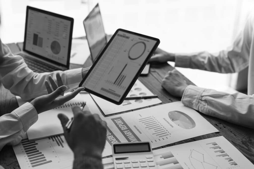 Midwest manufacturing marketing firm team reviewing digital analytics dashboards — Lillian Group Marketing's data-driven approach to manufacturing marketing in Illinois and the Midwest