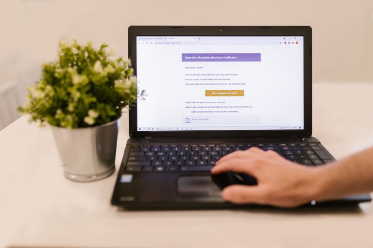 Person reading an email newsletter on a laptop