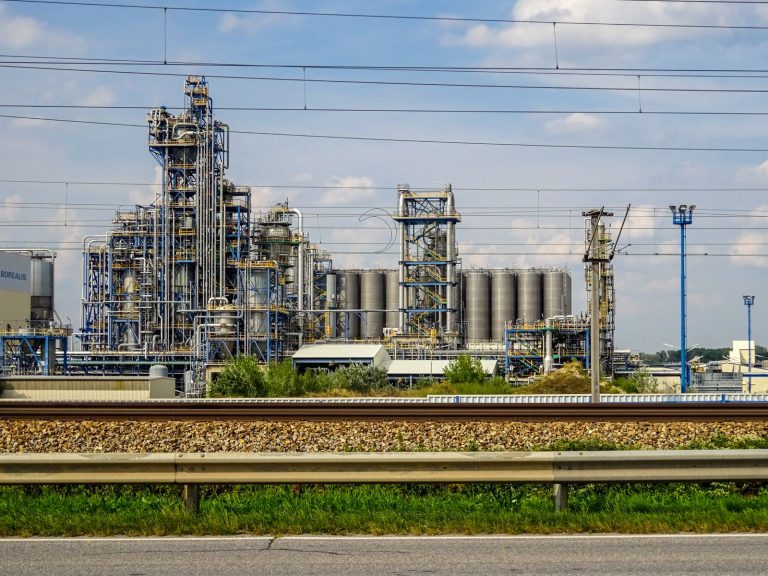 Industrial processing plant with towers and pipework