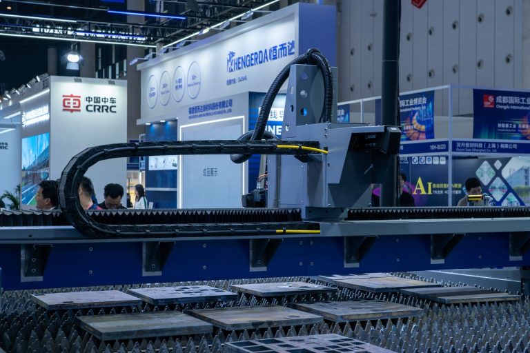 Industrial machinery on display at a manufacturing trade show