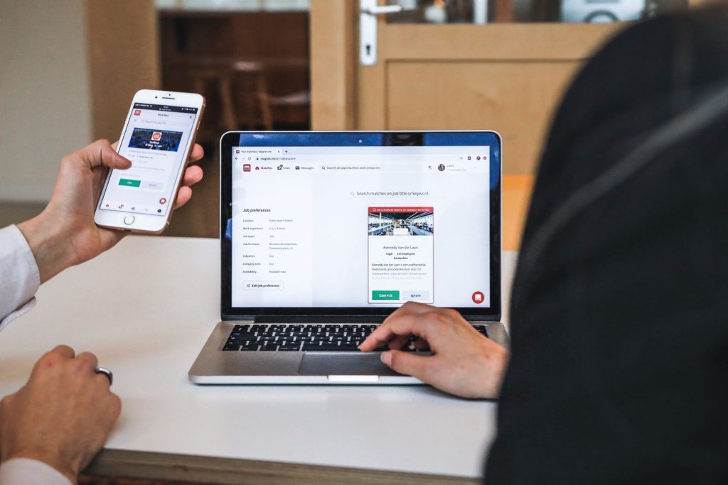 Website viewed on a smartphone and a laptop at the same time